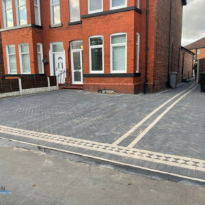 Two Adjacent Charcoal Paved Driveways with Natural Grey Borderlines in&hellip;