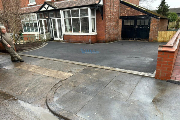 Two Neighbouring Tarmac Driveways with a Brick Dividing Wall in Stockport 5.jpeg